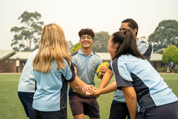 All Saints Catholic College Co-curricular Sport - students playing football