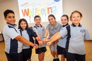 All Saints Catholic College News and Events students showing wrist ribbons